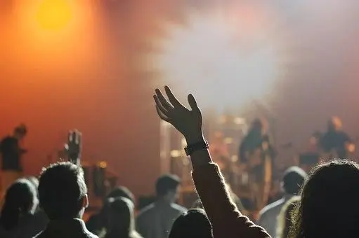 People listening to a band